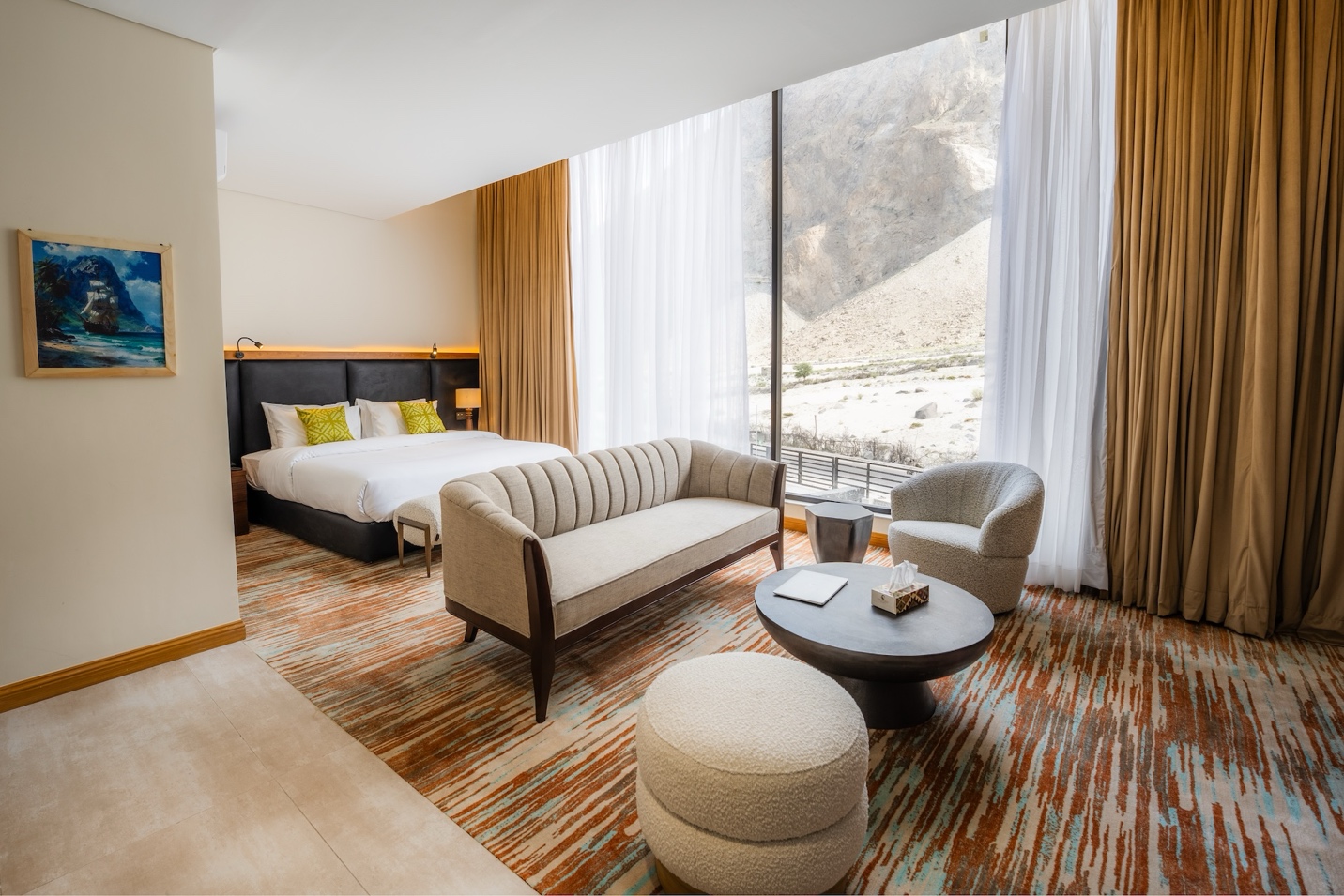 Junior Suite at FortuNorth with separate lounge and panoramic Karakoram views